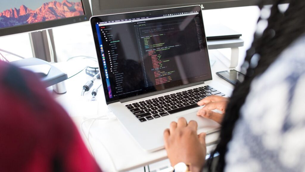 Building effective SOC 2026 - security analyst monitoring SIEM dashboard screens
